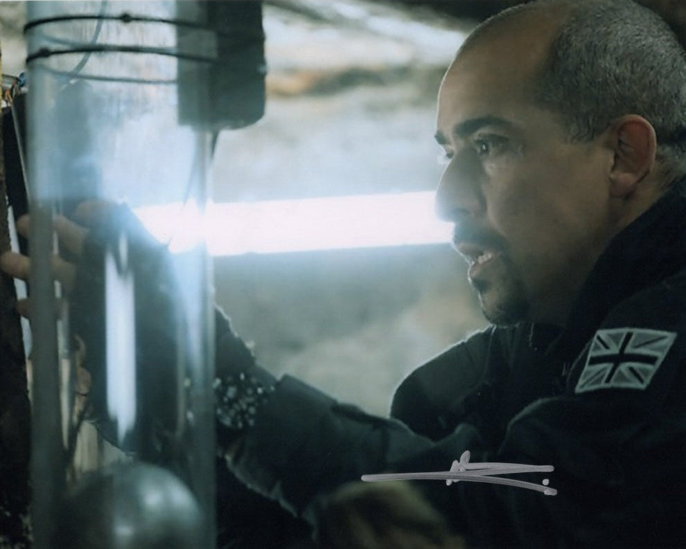 NABIL ELOUHABHI - Hassan Rahim in Trigger Point hand signed 10 x 8 photo