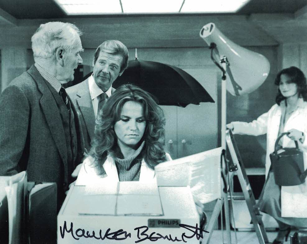 MAUREEN BENNETT -  Sharon Q's assistant in For Your Eyes Only