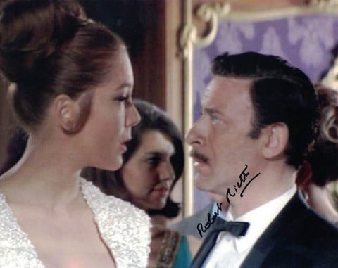 ROBERT RIETTY  as Casino Baccarat official in On Her Majestys Secret Service